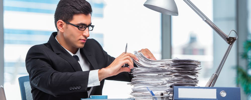 A man sorting out paperwork