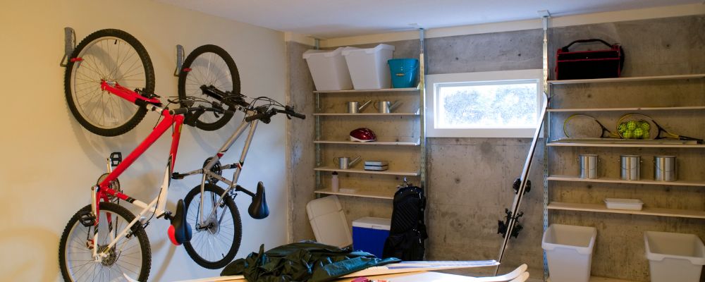 a tidy garage using different types of storage solutions